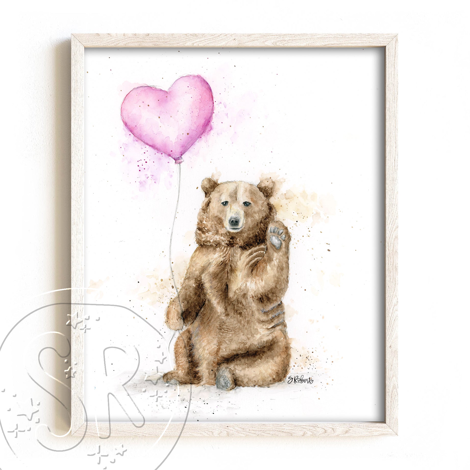 Framed artwork of a watercolor bear holding a pink heart balloon on a white background