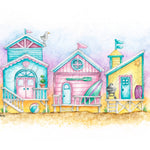 Colorful beach houses on a sandy shore with a pastel sky.