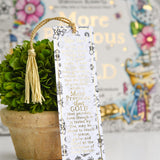 Decorative bookmark with tassel on a table with a colorful background