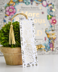 Decorative bookmark with tassel on a table with a colorful background