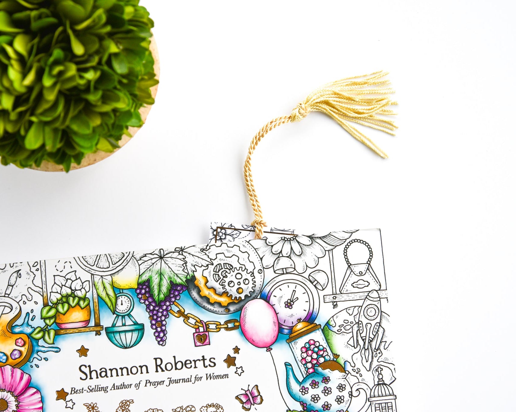 Colorful book with decorative elements on a white surface