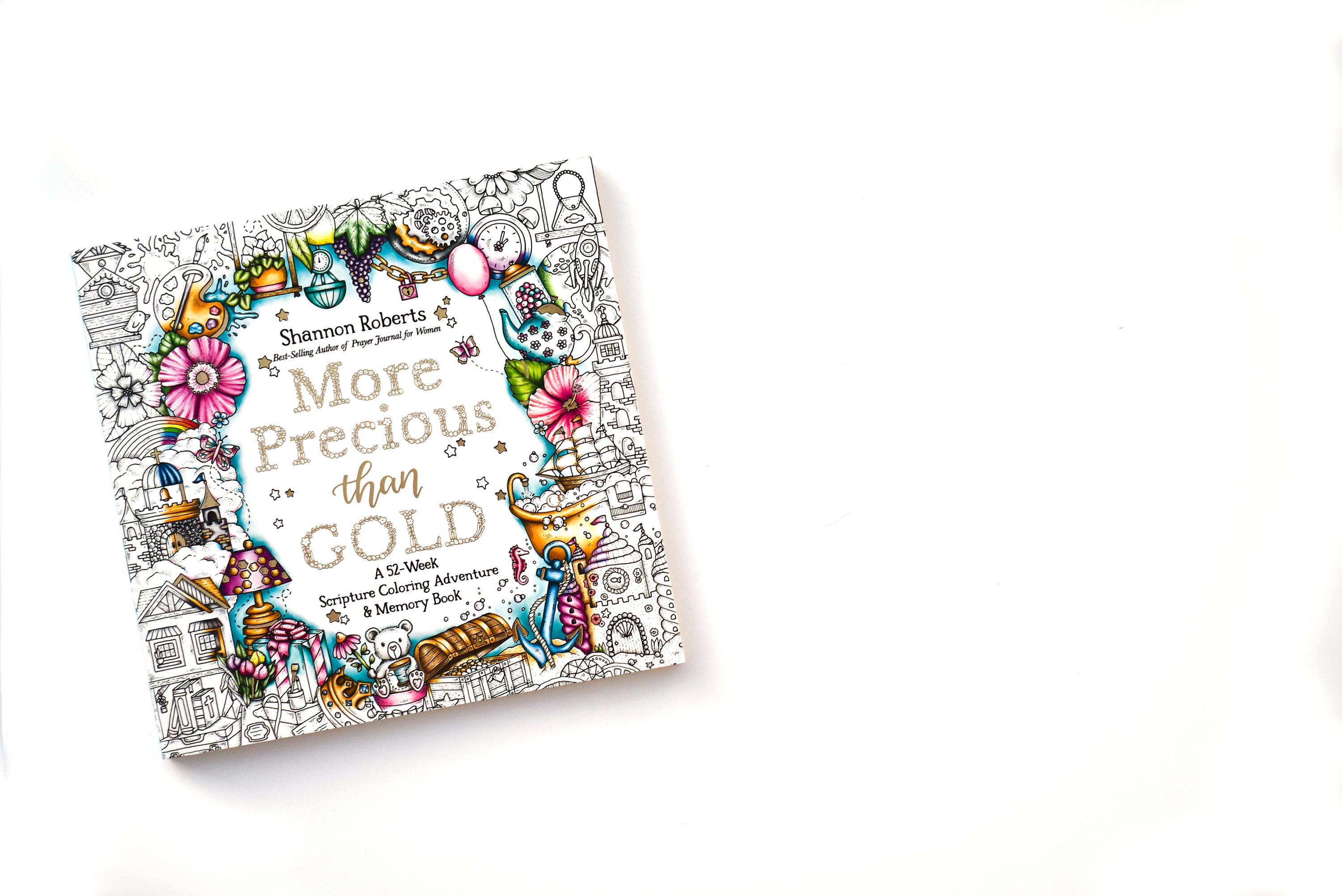 Colorful book titled 'More Precious than Gold' by Shannon Roberts on a white background
