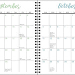 Two-page spread of a spiral-bound calendar showing September and October.