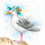 Seagull wearing a blue hat with a yellow bow on a white background